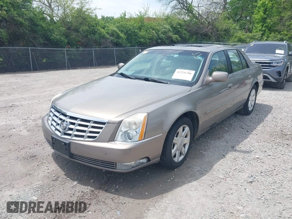 2006 Cadillac DTS 1SD z VIN 1G6KD57Y06U197794, wystawiony jako IAAI lot #42226706 z przebiegiem 135 748 mil mil oraz . Historia ofert i sprzedaży dostępna na DreamBid. Obrazek 2.