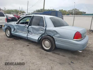 1999 Ford Crown Victoria z VIN 2FAFP73WXXX221069, wystawiony jako IAAI lot #41750127 z przebiegiem 177 142 mil mil oraz . Historia ofert i sprzedaży dostępna na DreamBid. Obrazek 3.