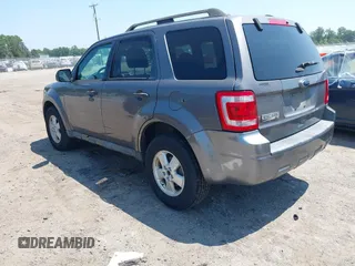 2011 Ford Escape XLT with VIN 1FMCU9D79BKC11522, listed as a IAAI auction lot 42844398 with 223,666 mi miles and . Bid and sale history available at DreamBid. Image 3.
