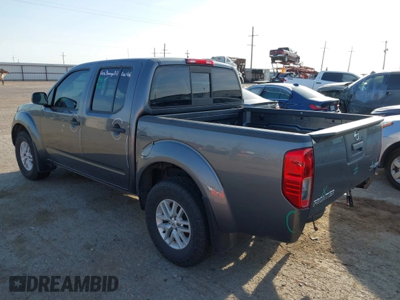 2021 Nissan Frontier SV with VIN 1N6ED0EB2MN702654, listed as a IAAI auction lot 42227414 with 142,309 mi miles and . Bid and sale history available at DreamBid. Image 3.