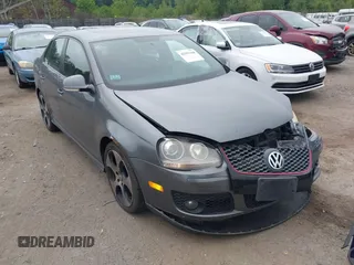 2009 Volkswagen Jetta z VIN 3VWDA71K39M066363, wystawiony jako IAAI lot #42591168 z przebiegiem 156 528 mil mil oraz . Historia ofert i sprzedaży dostępna na DreamBid. Obrazek 1.