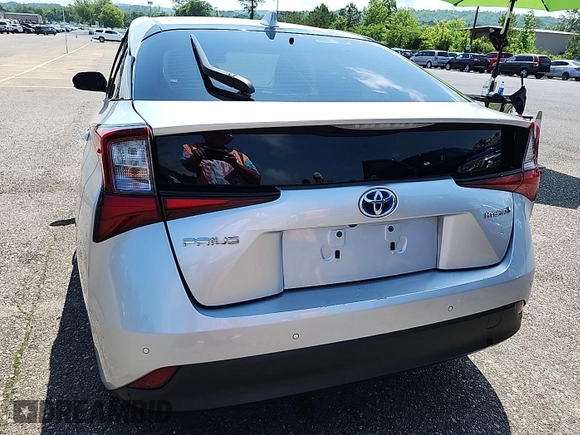 2021 Toyota Prius L Eco with VIN JTDKAMFU4M3144050, listed as a IAAI auction lot 42774220 with 173,180 mi miles and . Bid and sale history available at DreamBid. Image 28.