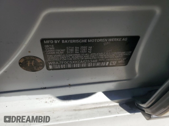 2019 BMW 7 Series 750i with VIN WBA7F0C5XKGM25348, listed as a Copart auction lot 46537485 with 54,365 mi miles and Salvage title. Bid and sale history available at DreamBid. Image 12.