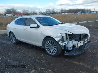 2014 Lincoln MKS with VIN 1LNHL9DK5EG612795, listed as a IAAI auction lot 41423252 with 151,117 mi miles. Bid and sale history available at carsss.com. Image 1.