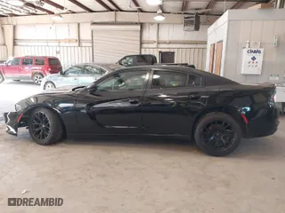 2016 Dodge Charger SXT with VIN 2C3CDXHGXGH166774, listed as a IAAI auction lot 41771461 with 187,660 mi miles. Bid and sale history available at carsss.com. Image 14.