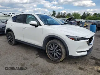 2018 Mazda CX-5 Grand Touring z VIN JM3KFBDM6J0447165, wystawiony jako Copart lot #56133015 z przebiegiem 80 579 mil mil oraz Szkoda całkowita • Salvage title. Historia ofert i sprzedaży dostępna na DreamBid. Obrazek 4.