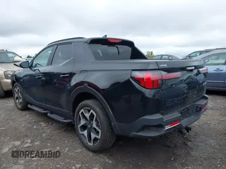 2022 Hyundai Santa Cruz Limited z VIN 5NTJEDAF3NH010999, wystawiony jako IAAI lot #42234746 z przebiegiem 18 463 mil mil oraz . Historia ofert i sprzedaży dostępna na DreamBid. Obrazek 3.