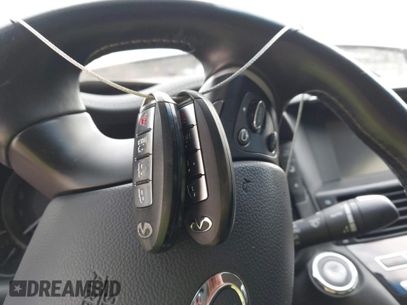 2015 Infiniti Q70 with VIN JN1BY1PP5FM601628, listed as a IAAI auction lot 41510075 with 102,363 mi miles and . Bid and sale history available at DreamBid. Image 11.