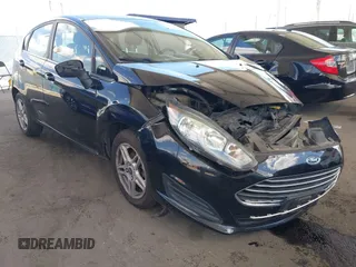 2019 Ford Fiesta SE z VIN 3FADP4EJ3KM102744, wystawiony jako IAAI lot #42256167 z przebiegiem 53 644 mil mil oraz . Historia ofert i sprzedaży dostępna na DreamBid. Obrazek 1.