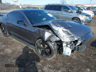 2021 Ford Mustang EcoBoost with VIN 1FA6P8TH4M5136345, listed as a IAAI auction lot 41503885 with 18,853 mi miles. Bid and sale history available at carsss.com. Image 1.