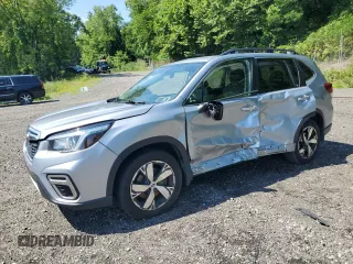 2020 Subaru Forester Touring with VIN JF2SKAXC3LH405317, listed as a Copart auction lot 64608205 with 58,033 mi miles and Salvage title. Bid and sale history available at DreamBid. Image 1.
