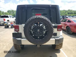 2017 Jeep Wrangler Unlimited Sahara with VIN 1C4BJWEG7HL684621, listed as a Copart auction lot 62403015 with 92,786 mi miles and Salvage title. Bid and sale history available at DreamBid. Image 6.