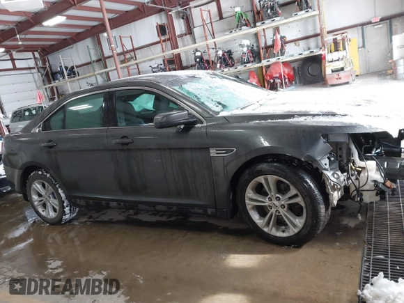 2015 Ford Taurus SEL with VIN 1FAHP2E89FG202589, listed as a IAAI auction lot 41592298 with 105,410 mi miles and . Bid and sale history available at carsss.com. Image 13.