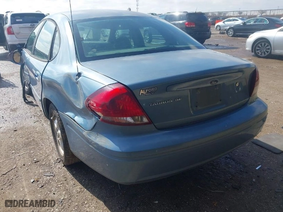 2005 Ford Taurus SE with VIN 1FAFP53U45A176669, listed as a IAAI auction lot 41357877 with 209392 miles. Bid and sale history available at carsss.com. Image 3.