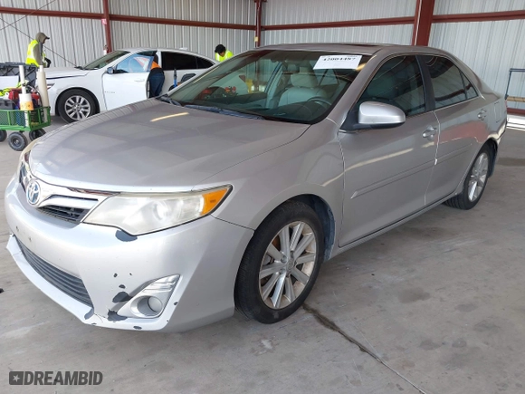 2014 Toyota Camry Hybrid LE with VIN 4T1BD1FK6EU128766, listed as a IAAI auction lot 42004487 with 280,013 mi miles. Bid and sale history available at carsss.com. Image 2.