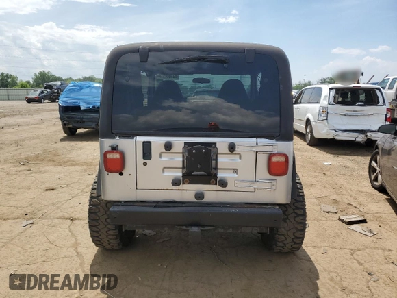 2002 Jeep Wrangler X с VIN 1J4FA39S52P770423, выставлен на аукционе Copart как лот 62498885 с пробегом 87 433 миль миль и Чистый • Clean title. История ставок и продаж доступна на DreamBid. Изображение 6.
