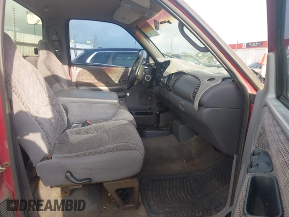 1999 Dodge 1500 z VIN 1B7HF16Y2XS185896, wystawiony jako IAAI lot #42251046 z przebiegiem 258 932 mil mil oraz . Historia ofert i sprzedaży dostępna na DreamBid. Obrazek 5.