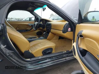 2002 Porsche Boxster z VIN WP0CA298X2U623474, wystawiony jako IAAI lot #41754154 z przebiegiem 98 896 mil mil oraz . Historia ofert i sprzedaży dostępna na DreamBid. Obrazek 5.