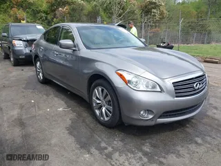 2013 Infiniti M37 with VIN JN1BY1AR5DM601409, listed as a IAAI auction lot 41956080 with 191,800 mi miles. Bid and sale history available at carsss.com. Image 1.