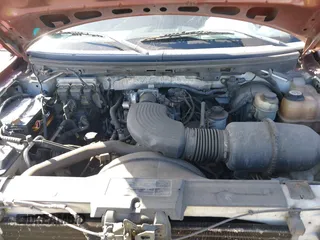 2006 Ford F-150 STX with VIN 1FTRX12W96KC21233, listed as a IAAI auction lot 41959711 with 312,198 mi miles. Bid and sale history available at carsss.com. Image 10.