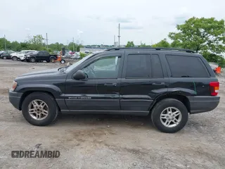 2004 Jeep Grand Cherokee Laredo z VIN 1J4GW48S54C198115, wystawiony jako IAAI lot #42351240 z przebiegiem 189 416 mil mil oraz . Historia ofert i sprzedaży dostępna na DreamBid. Obrazek 15.