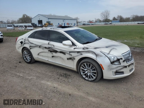 2013 Cadillac XTS Platinum z VIN 2G61V5S38D9204439, wystawiony jako Copart lot #53886495 z przebiegiem 89 940 mil mil oraz Szkody całkowita. Historia ofert i sprzedaży dostępna na DreamBid. Obrazek 4.