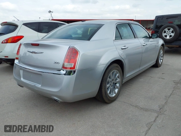 2012 Chrysler 300 Limited with VIN 2C3CCACG9CH223032, listed as a IAAI auction lot 42144147 with 139,625 mi miles. Bid and sale history available at carsss.com. Image 4.