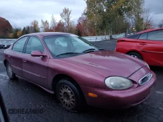 1996 Mercury Sable LS z VIN 1MELM53S9TG646191, wystawiony jako Copart lot #81002674 z przebiegiem 163 808 mil mil oraz Tytuł czysty. Historia ofert i sprzedaży dostępna na DreamBid. Obrazek 4.