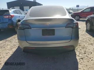 2024 Tesla Model Y Long Range with VIN 7SAYGDEE6RA321064, listed as a Copart auction lot 58889795 with 48,857 mi miles and Salvage title. Bid and sale history available at DreamBid. Image 6.