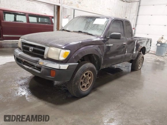 1999 Toyota Tacoma with VIN 4TAWM72N5XZ433296, listed as a IAAI auction lot 42595432 with 233,075 mi miles and . Bid and sale history available at DreamBid. Image 2.