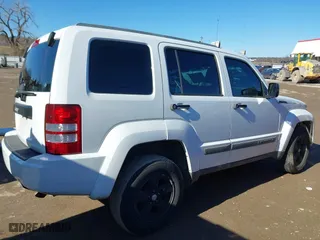2011 Jeep Liberty Sport with VIN 1J4PP2GK4BW580280, listed as a IAAI auction lot 41482961 with 165,130 mi miles. Bid and sale history available at carsss.com. Image 14.