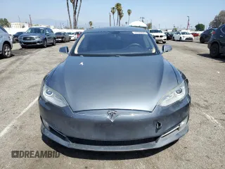2014 Tesla Model S 60 z VIN 5YJSA1H17EFP36595, wystawiony jako Copart lot #53705035 z przebiegiem 148 254 mil mil oraz Szkoda całkowita • Salvage title. Historia ofert i sprzedaży dostępna na DreamBid. Obrazek 5.