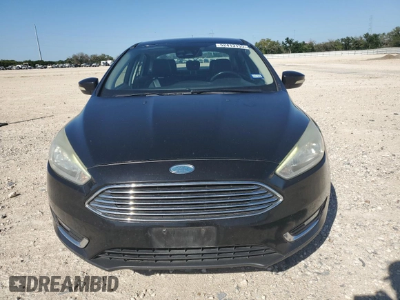 2015 Ford Focus Titanium with VIN 1FADP3J24FL305710, listed as a Copart auction lot 52413155 with 181,571 mi miles and Clean Title. Bid and sale history available at carsss.com. Image 5.