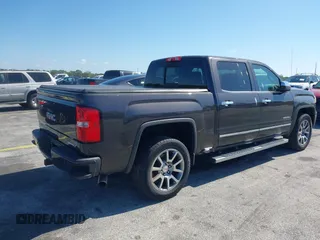 2015 GMC Sierra 1500 Denali with VIN 3GTU2WEC2FG422289, listed as a IAAI auction lot 42023170 with 165,856 mi miles and . Bid and sale history available at DreamBid. Image 4.
