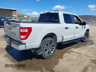 2023 Ford F-150 XL with VIN 1FTFW1E51PFB15197, listed as a IAAI auction lot 41869063 with 33,980 mi miles and . Bid and sale history available at DreamBid. Image 4.