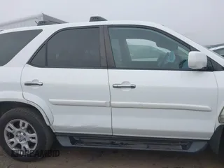2004 Acura MDX Touring Pkg w/Navigation with VIN 2HNYD18874H545924, listed as a IAAI auction lot 41080740 with 343,574 mi miles. Bid and sale history available at carsss.com. Image 13.