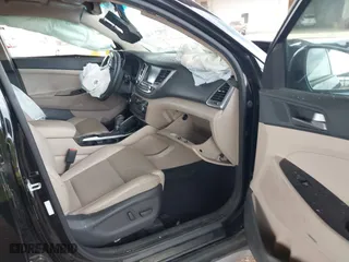 2017 Hyundai Tucson Value with VIN KM8J33A22HU316495, listed as a IAAI auction lot 41896507 with 82,517 mi miles. Bid and sale history available at carsss.com. Image 5.