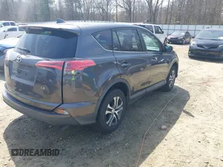 2017 Toyota RAV4 LE with VIN 2T3ZFREV9HW390859, listed as a IAAI auction lot 41802727 with 167,085 mi miles and . Bid and sale history available at carsss.com. Image 4.