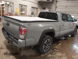 2021 Toyota Tacoma 4WD SR5 with VIN 3TMDZ5BNXMM111204, listed as a IAAI auction lot 41308159 with 46,024 mi miles. Bid and sale history available at carsss.com. Image 4.