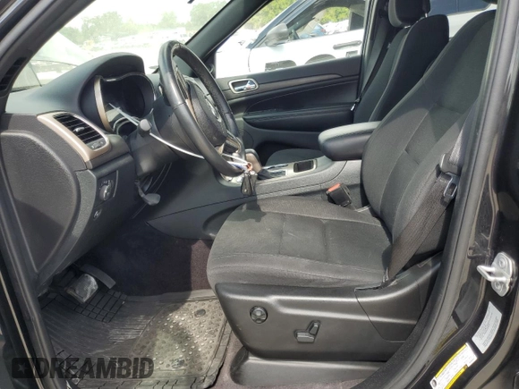 2016 Jeep Grand Cherokee Laredo with VIN 1C4RJFAG4GC343521, listed as a Copart auction lot 64619655 with 97,776 mi miles and Clean title. Bid and sale history available at DreamBid. Image 7.