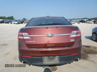 2015 Ford Taurus SEL with VIN 1FAHP2E96FG161735, listed as a Copart auction lot 61865294 with 148,070 mi miles and Salvage Title. Bid and sale history available at DreamBid. Image 6.