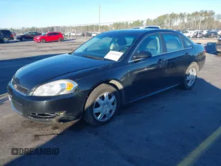 2014 Chevrolet Impala Limited Police Police with VIN 2G1WD5E39E1110595, listed as a IAAI auction lot 41261653 with 141,058 mi miles. Bid and sale history available at carsss.com. Image 2.