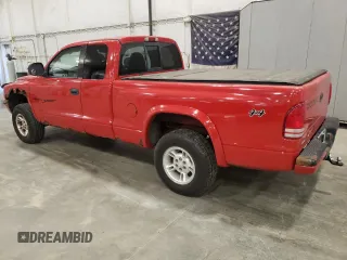 1999 Dodge Dakota SLT with VIN 1B7GG22YXXS215599, listed as a Copart auction lot 54630655 with 141,255 mi miles and Clean Title. Bid and sale history available at DreamBid. Image 2.