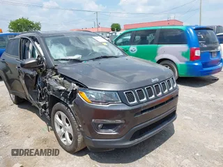 2019 Jeep Compass Latitude with VIN 3C4NJCBB1KT833007, listed as a IAAI auction lot 42401265 with 106,973 mi miles and . Bid and sale history available at DreamBid. Image 1.