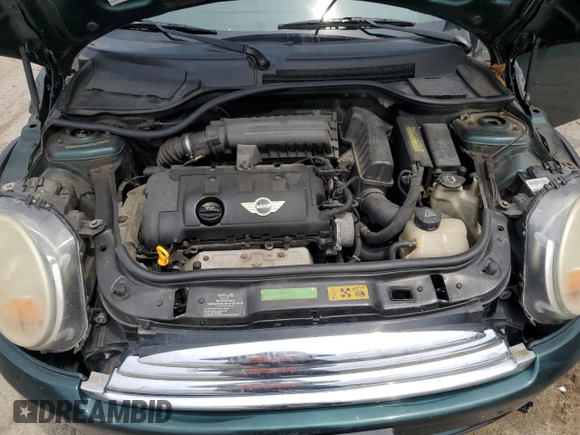 2007 MINI Hardtop with VIN WMWMF33537TL77985, listed as a Copart auction lot 61908635 with 180,470 mi miles and Salvage title. Bid and sale history available at DreamBid. Image 11.