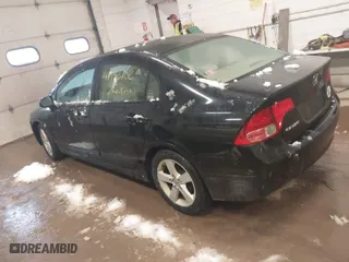 2006 Honda Civic Sdn EX with VIN 1HGFA16806L026147, listed as a IAAI auction lot 41932702 with 215,651 mi miles. Bid and sale history available at carsss.com. Image 3.