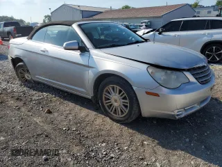 2009 Chrysler Sebring Touring z VIN 1C3LC55D89N501090, wystawiony jako Copart lot #54007345 z przebiegiem 111 381 mil mil oraz Szkody całkowita. Historia ofert i sprzedaży dostępna na DreamBid. Obrazek 4.