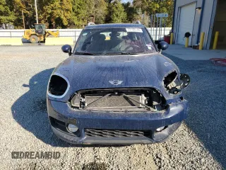 2018 MINI Countryman Cooper S E with VIN WMZYU7C47J3E56451, listed as a Copart auction lot 77193144 with 60,949 mi miles and Salvage Title. Bid and sale history available at carsss.com. Image 5.