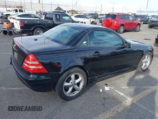 2003 Mercedes-Benz SLK-Class 3.2L with VIN WDBKK65F43F281612, listed as a IAAI auction lot 41674178 with 153,517 mi miles. Bid and sale history available at carsss.com. Image 4.