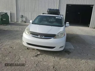 2008 Toyota Sienna XLE z VIN 5TDZK22CX8S122829, wystawiony jako Copart lot #58202065 z przebiegiem 228 678 mil mil oraz Szkoda całkowita • Salvage title. Historia ofert i sprzedaży dostępna na DreamBid. Obrazek 14.